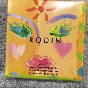 COPY - Rodin luxury illuminating powder. New in box plastic wrap intact. .31 oz